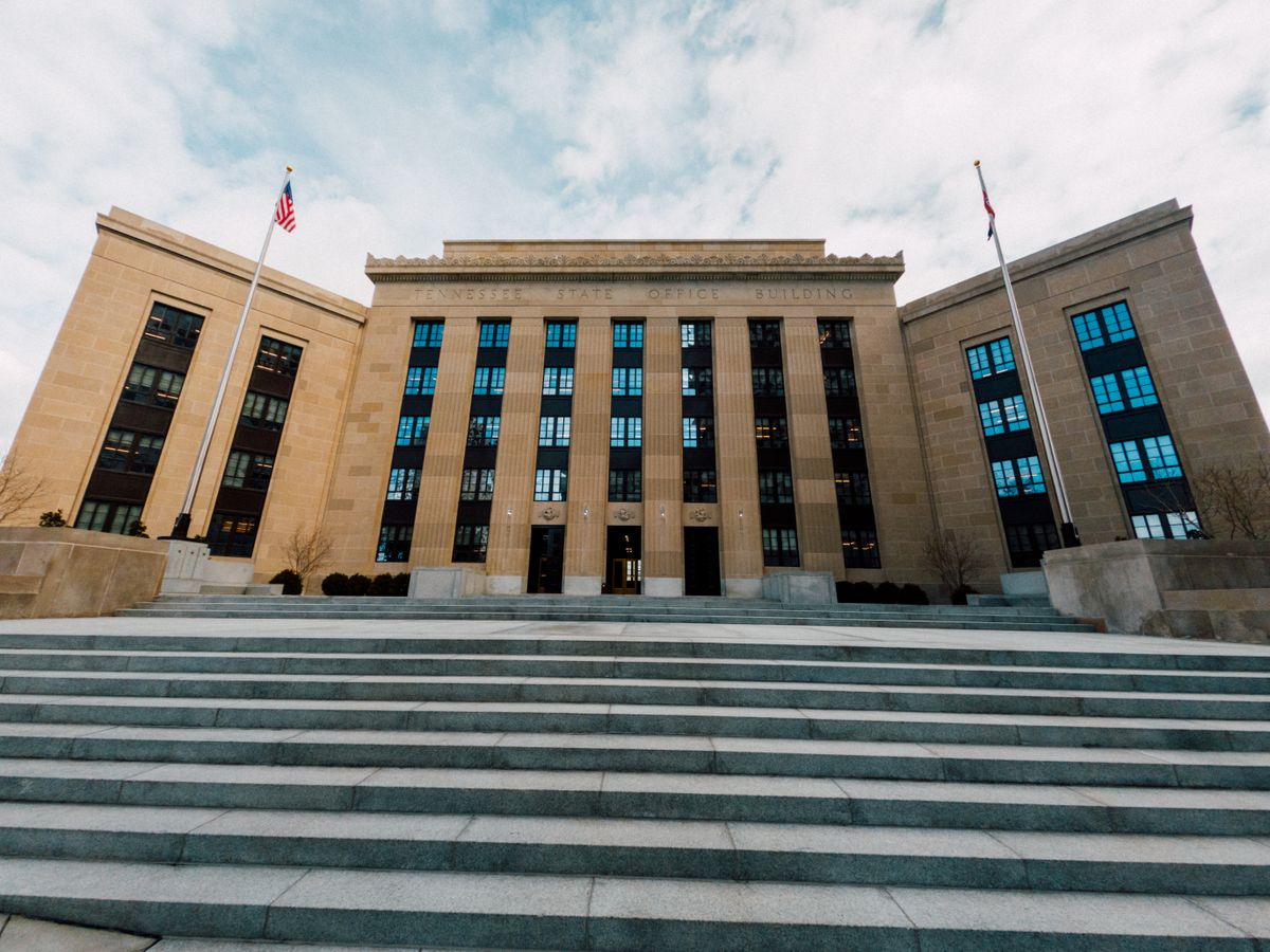 Federal Reserve building exterior with US flags
